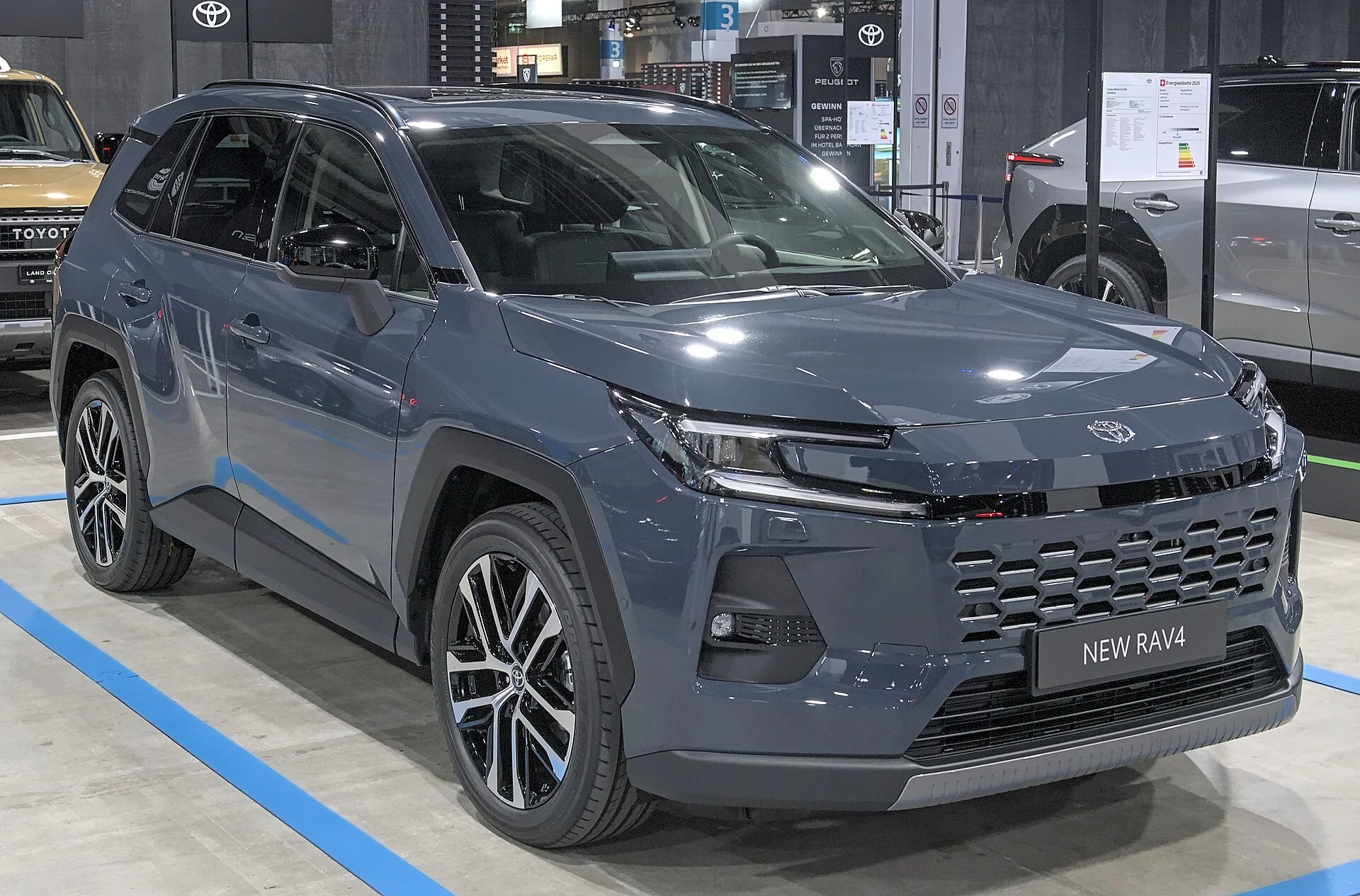 The redesigned sixth-generation Toyota RAV4 plug-in hybrid, front three-quarter view